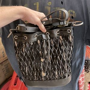 INC luci drawstring crossbody